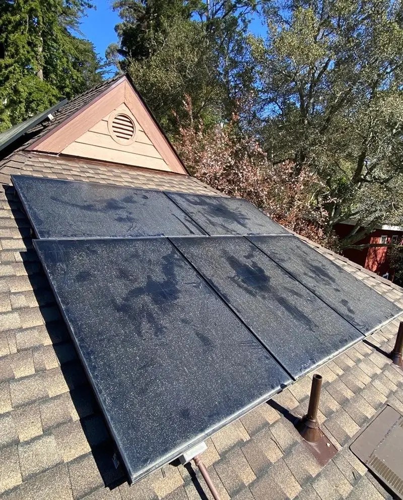 Before — Roof Cleaning — solar panel array washed clear of dust and film for full output.