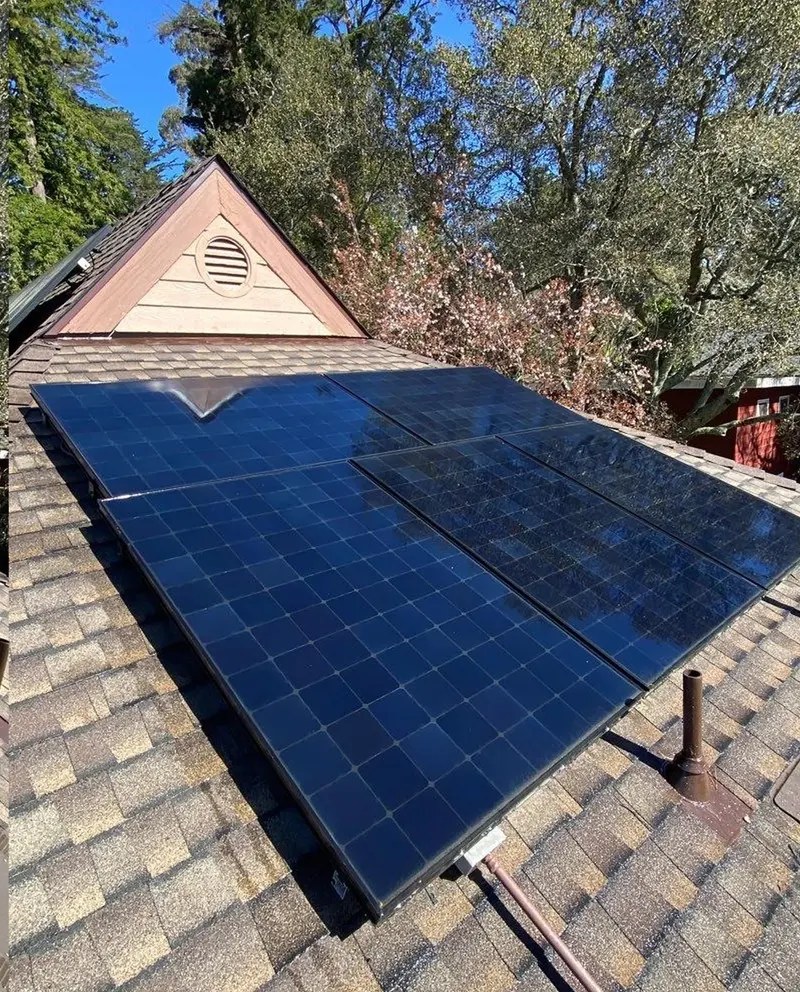 After — Roof Cleaning — solar panel array washed clear of dust and film for full output.