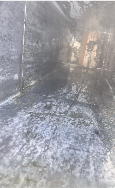 After — Horizontal duct run — heavy carbon buildup removed through access panels.